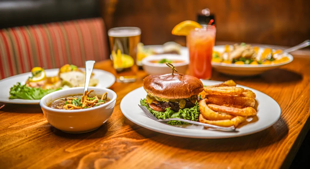 Hamburger Fries and drinks on table at https://j1v.ca9.myftpupload.com/